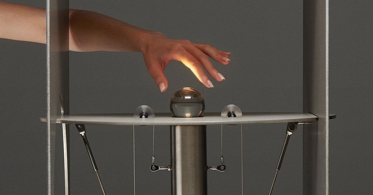kinetic lighting activates mechanical movement in a sculpture of steel and glass