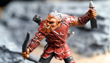 Vancouver, Canada - January 15, 2012: A hobgoblin archer from the Wizards of the Coast tabletop Dungeons and Dragons game, posed on a rocky background.