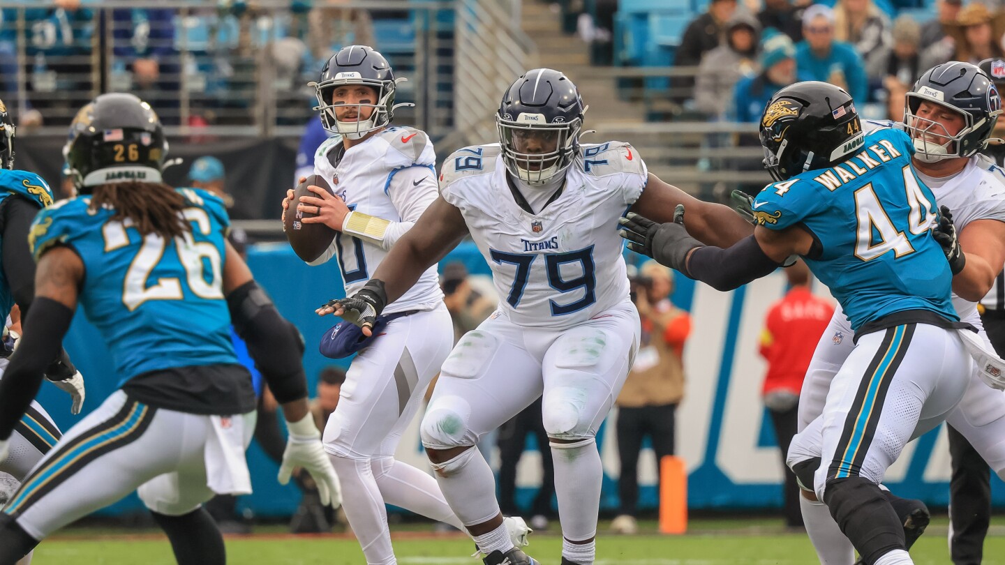 Titans release C Lloyd Cushenberry, S Xavier Woods