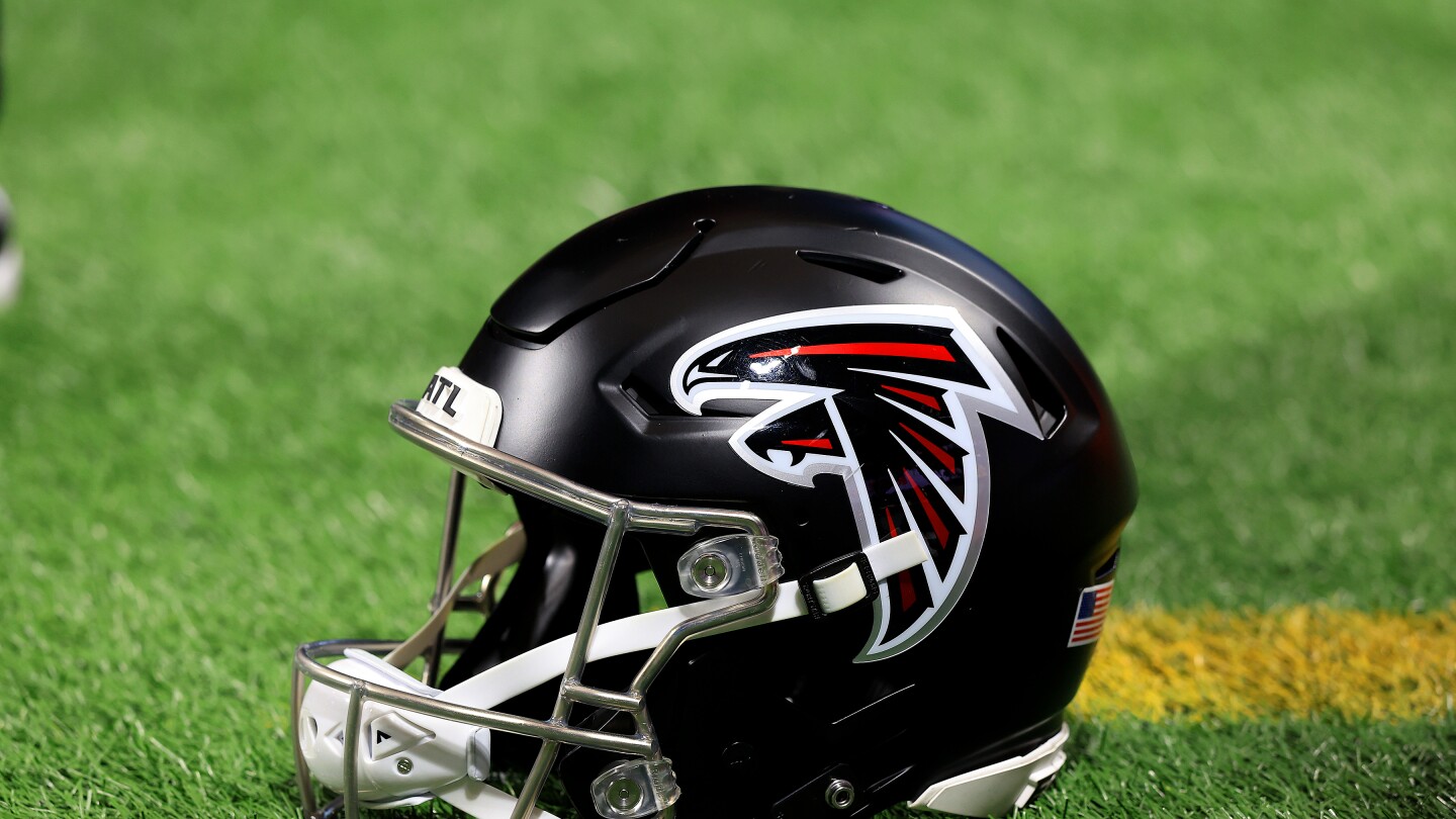 Falcons fire assistant DL coach LaTroy Lewis