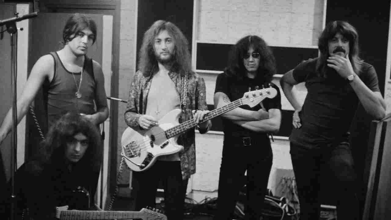 Deep Purple posing for a photograph in the recording studio in the early 1970s