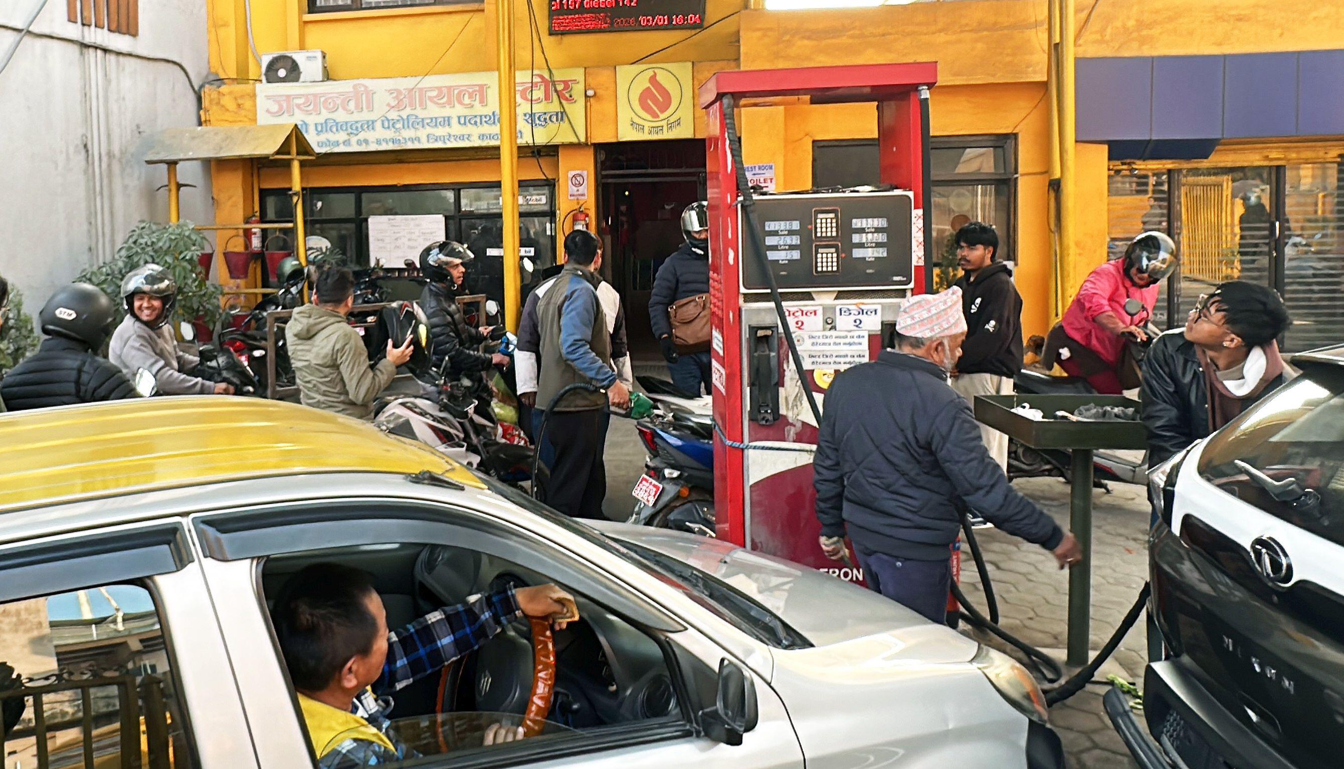 Vehicles line up at a petrol station in Kathmandu, Nepal, as motorists rush to refuel amid fears of fuel shortages.
