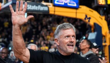 Michigan football head coach Kyle Whittingham waves at the crowd as he is being introduced on the floor during the first half between Michigan and USC at Crisler Center in Ann Arbor on Friday, Jan. 2, 2026.