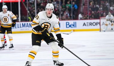 Mar 17, 2026; Montreal, Quebec, CAN; Boston Bruins center Fraser Minten (93) plays the puck against the Montreal Canadiens during the third period at Bell Centre. Mandatory Credit: David Kirouac-Imagn Images