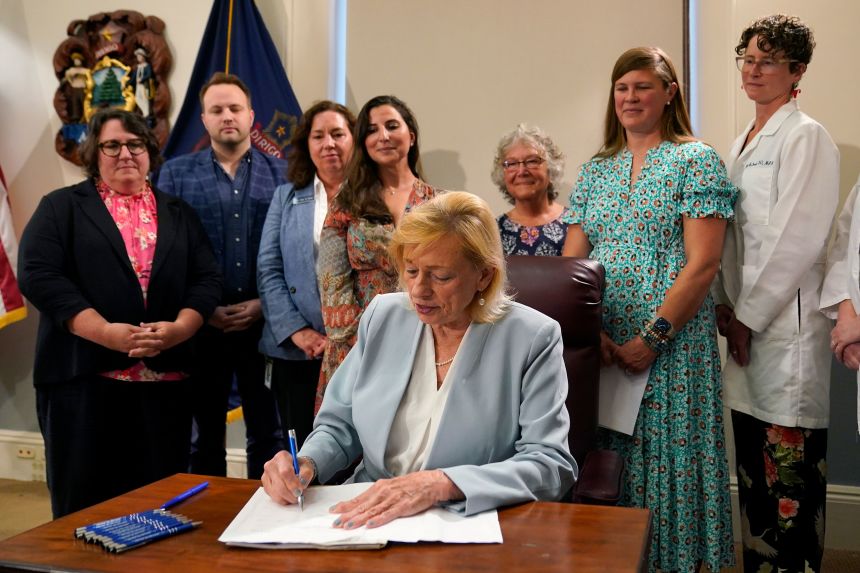 Gov. Mills signs into law a state bill expanding access to abortions later in pregnancy in July 2023.