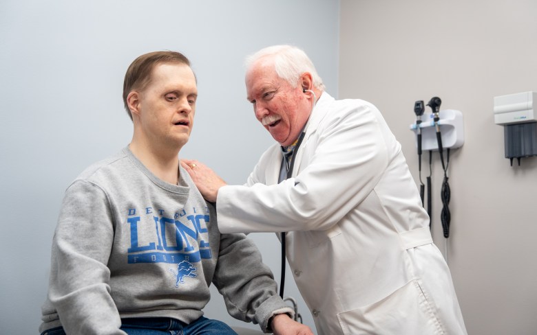 doctor examines a patient