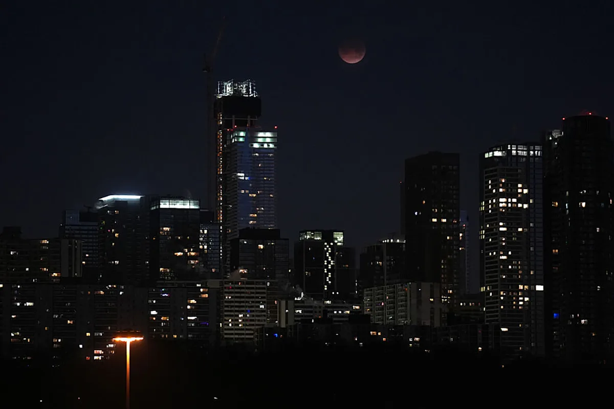 The lunar eclipse of March 3, 2026 seen over the city skyline in Toronto, Canada. Photo by Mert Alper Dervis/Anadolu via Getty Images