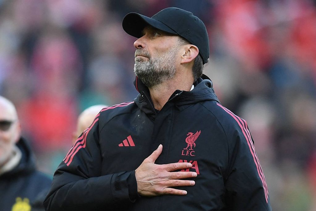Liverpool Legends' manager Jurgen Klopp gestures to fans on the pitch after the Legends football match between Liverpool Legends and Dortmund Legends at Anfield in Liverpool, north-west England on March 28, 2026. (Photo by PETER POWELL / AFP via Getty Images)