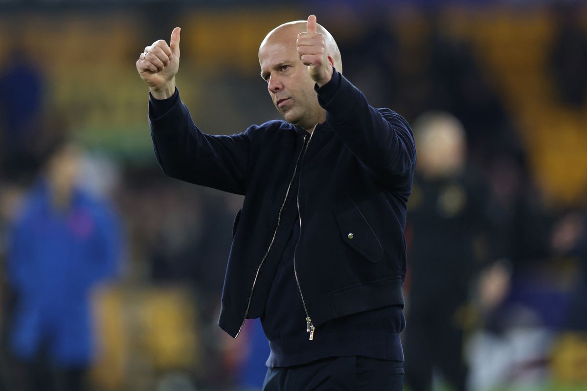 Liverpool's Dutch manager Arne Slot celebrates on the pitch after the English FA Cup fifth round football match between Wolverhampton Wanderers and Liverpool at the Molineux stadium in Wolverhampton, central England on March 6, 2026. Liverpool won the game 3-1. (Photo by Darren Staples / AFP via Getty Images) / RESTRICTED TO EDITORIAL USE. No use with unauthorized audio, video, data, fixture lists, club/league logos or 'live' services. Online in-match use limited to 120 images. An additional 40 images may be used in extra time. No video emulation. Social media in-match use limited to 120 images. An additional 40 images may be used in extra time. No use in betting publications, games or single club/league/player publications. / 