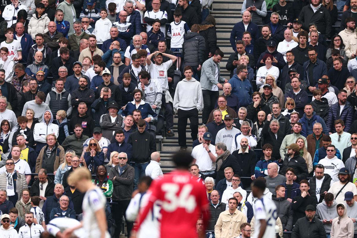 Tottenham Hotspur fans watch their team lose the Premier League match at home against Nottingham Forest