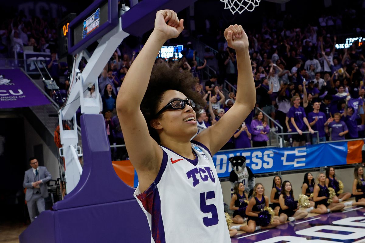 Olivia Miles #5 of the TCU Horned Frogs celebrates following the overtime victory over the Washington Huskies in the Second Round of the NCAA Women's Basketball Tournament on March 22, 2026 at Schollmaier Arena in Fort Worth, Texas