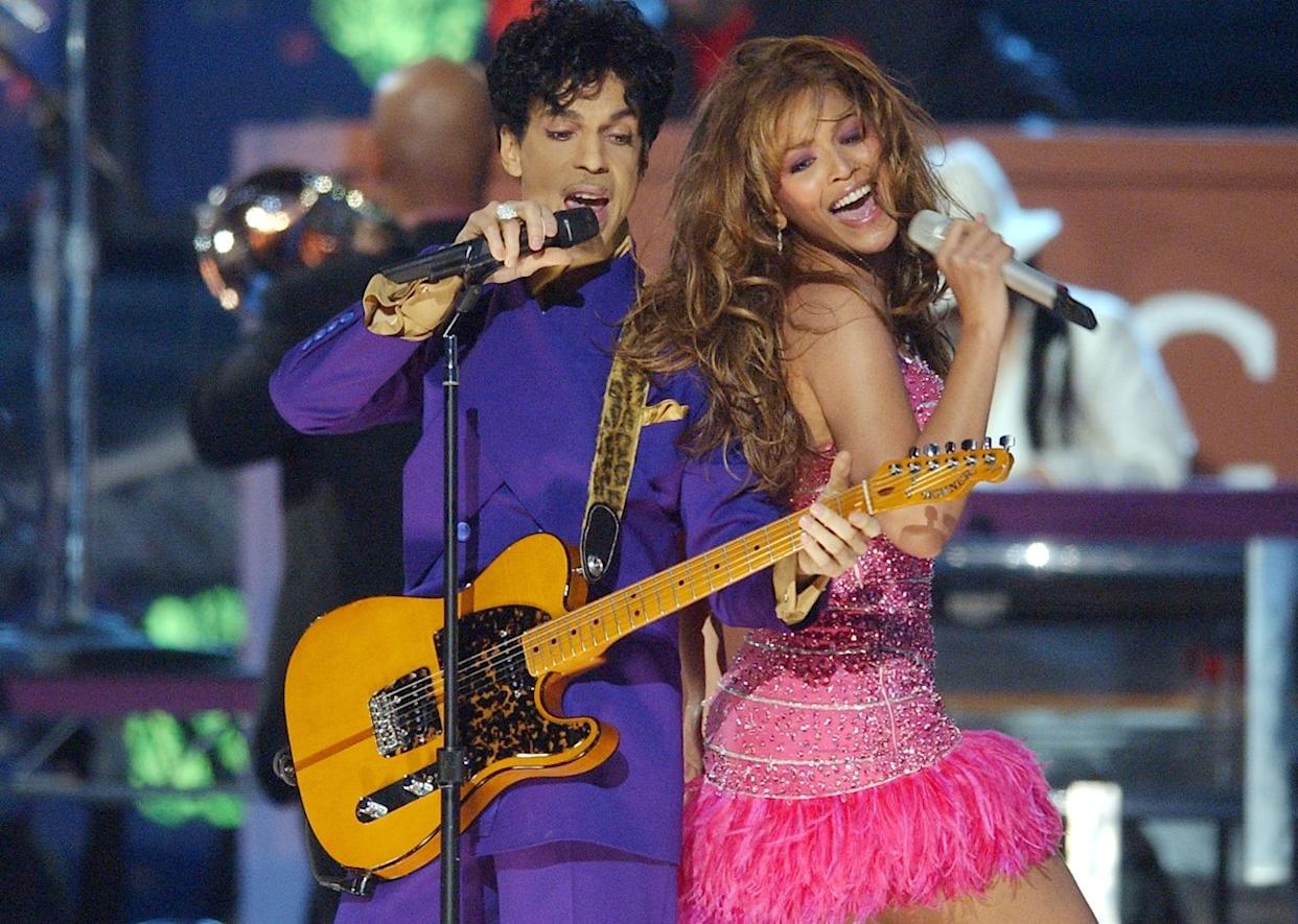 Prince and Beyonce perform onstage. - 