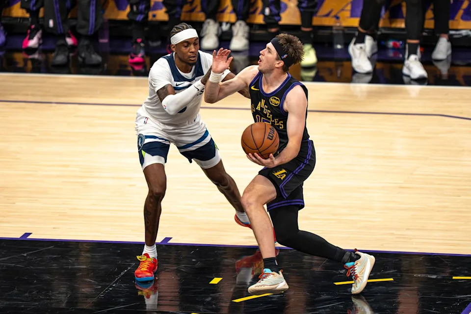 Los Angeles Lakers guard Austin Reaves (15) drawing a foul during an NBA basketball game against the Minnesota Timberwolves on March 10th, 2026 in Los Angeles, CA.