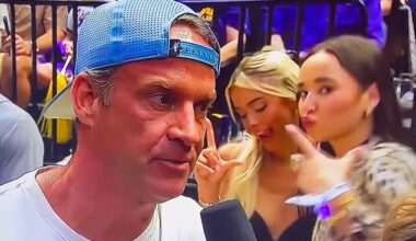 Livvy Dunne couldn't resist photobombing LSU football head coach Lane Kiffin on Friday night