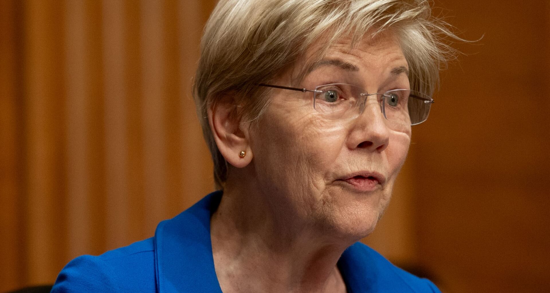 Elizabeth Warren demands answers on costs, economic impact of 'illegal and reckless war'