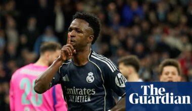 Vinícius finishes off 10-man Manchester City as Real Madrid ease into last eight | Champions League