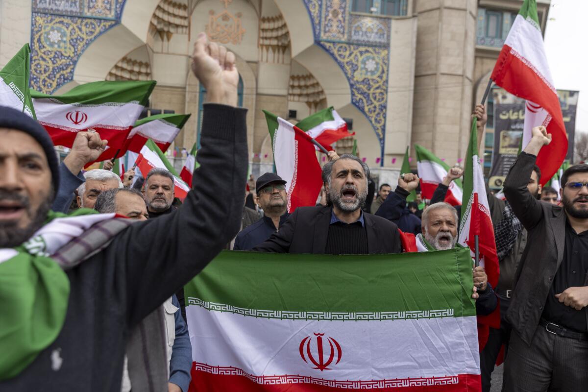 Iranians protest on Saturday in Tehran against attacks on Iran by Israel and the United States.