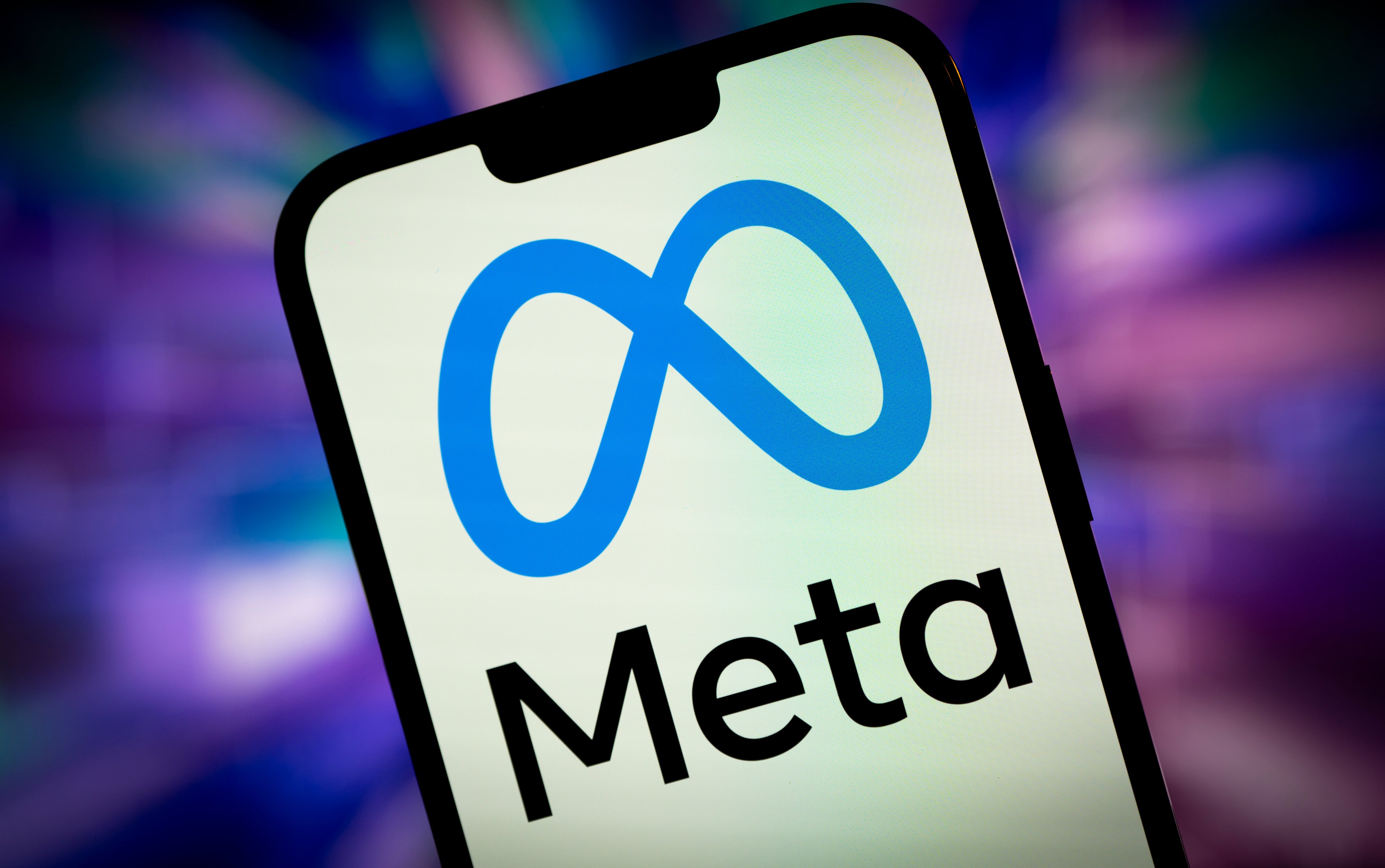 Meta logo on a mobile phone.