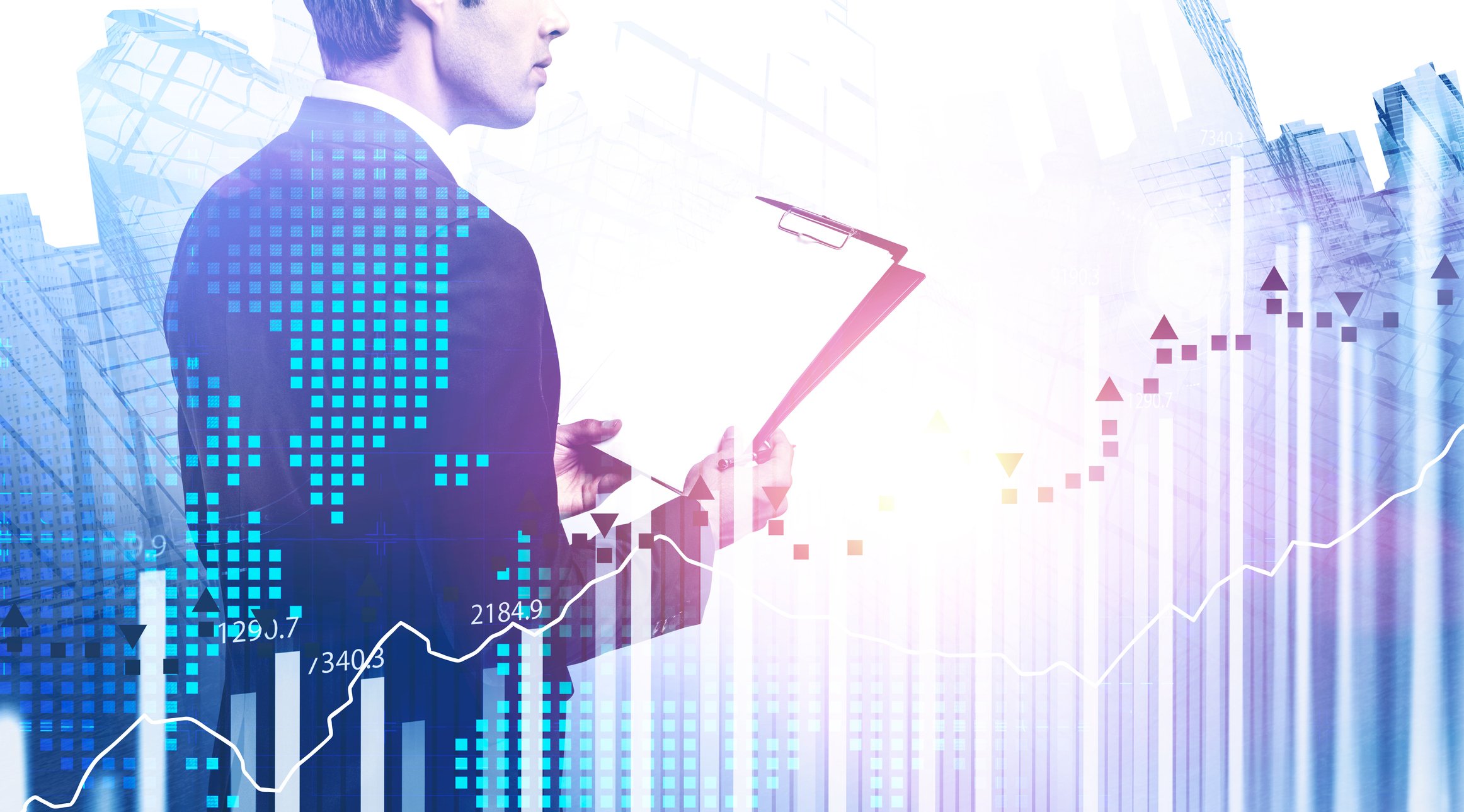 A person holding a clipboard next to a steadily rising chart.