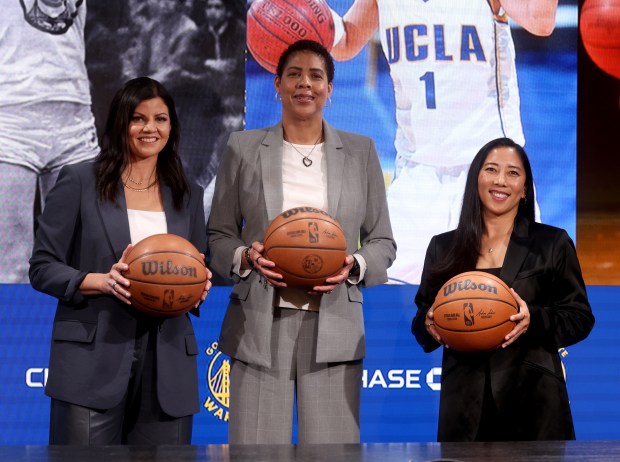 NBC Sports and Athletics broadcaster Jenny Cavnar, Naismith Basketball Hall of Famer Cheryl Miller and Golden State Valkyries head coach Natalie Nakase, from right, pose for photos during a press conference before the Golden State Warriors NBA game against the LA Clippers at the Chase Center in San Francisco, Calif., on Monday, March 2, 2026. (Jane Tyska/Bay Area News Group)