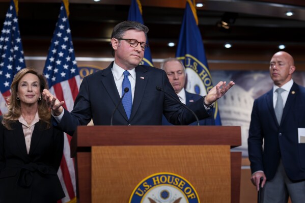 Speaker of the House Mike Johnson, R-La., gestures as he and the GOP leadership talk about the war against Iran, during a news conference at the Capitol in Washington, Wednesday, March 4, 2026. (AP Photo/J. Scott Applewhite)