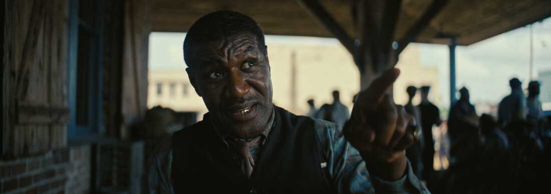 DELROY LINDO as Delta Slim in Warner Bros. Pictures’ “SINNERS,” a Warner Bros. Pictures release. Source: