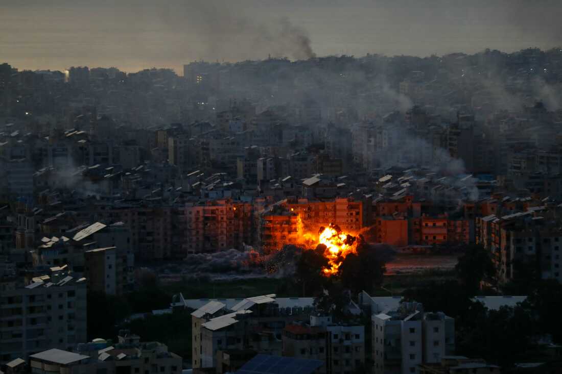 A fireball ascends from the site of an Israeli airstrike that targeted an area in Beirut's southern suburbs as Israel attacked Lebanon Friday.
