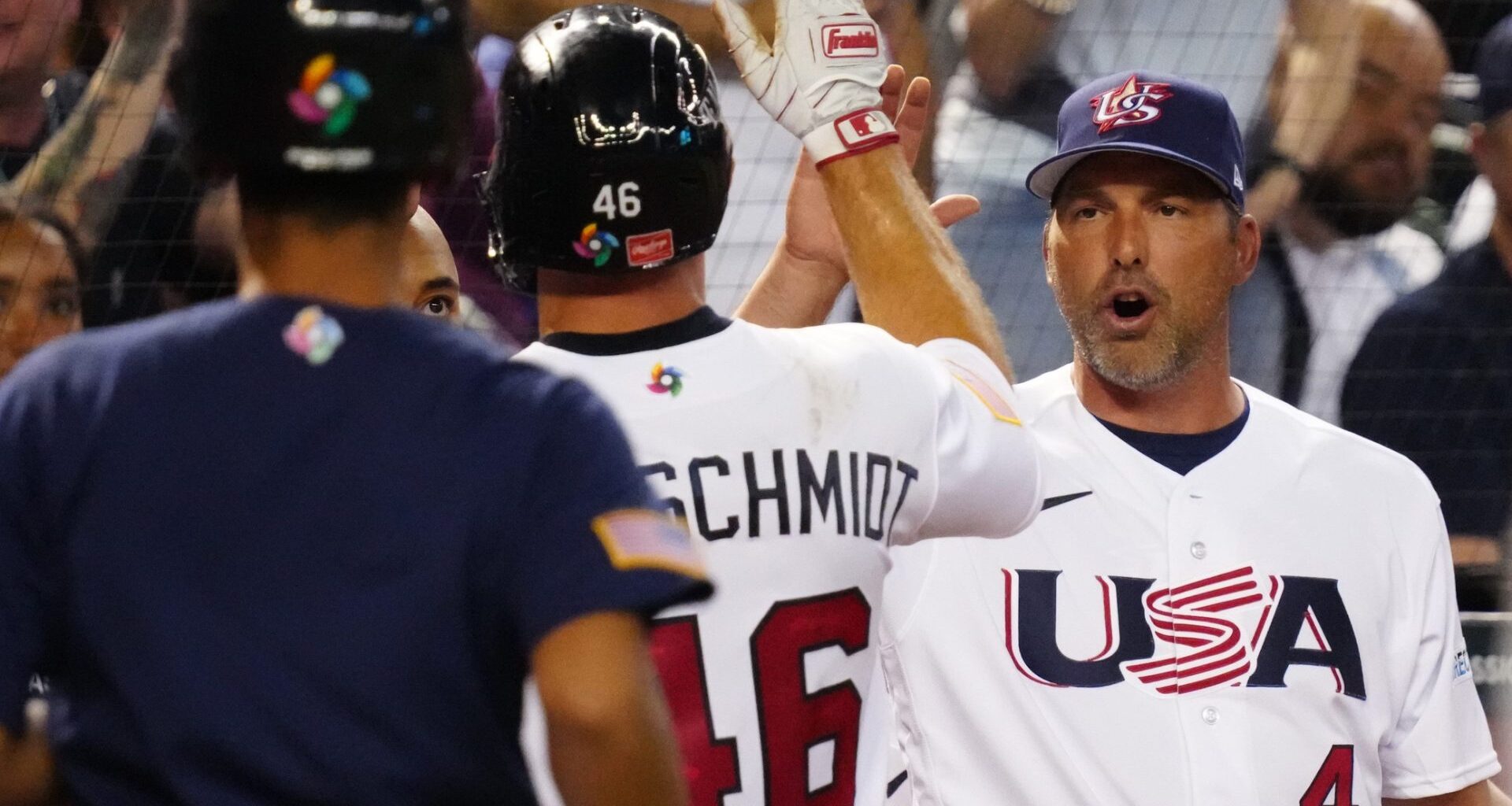 USA manager Mark DeRosa high-fives first baseman Paul Goldschmidt (46) during the World Baseball Classic against Great Britain at Chase Field in Phoenix on March 11, 2023. Baseball World Baseball Classic Opening Day
