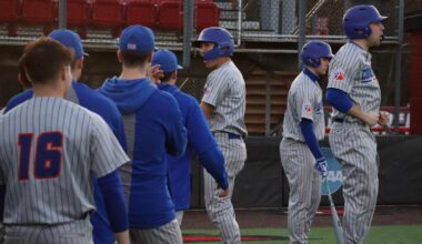 Bears split Opening Day doubleheader with Catholic