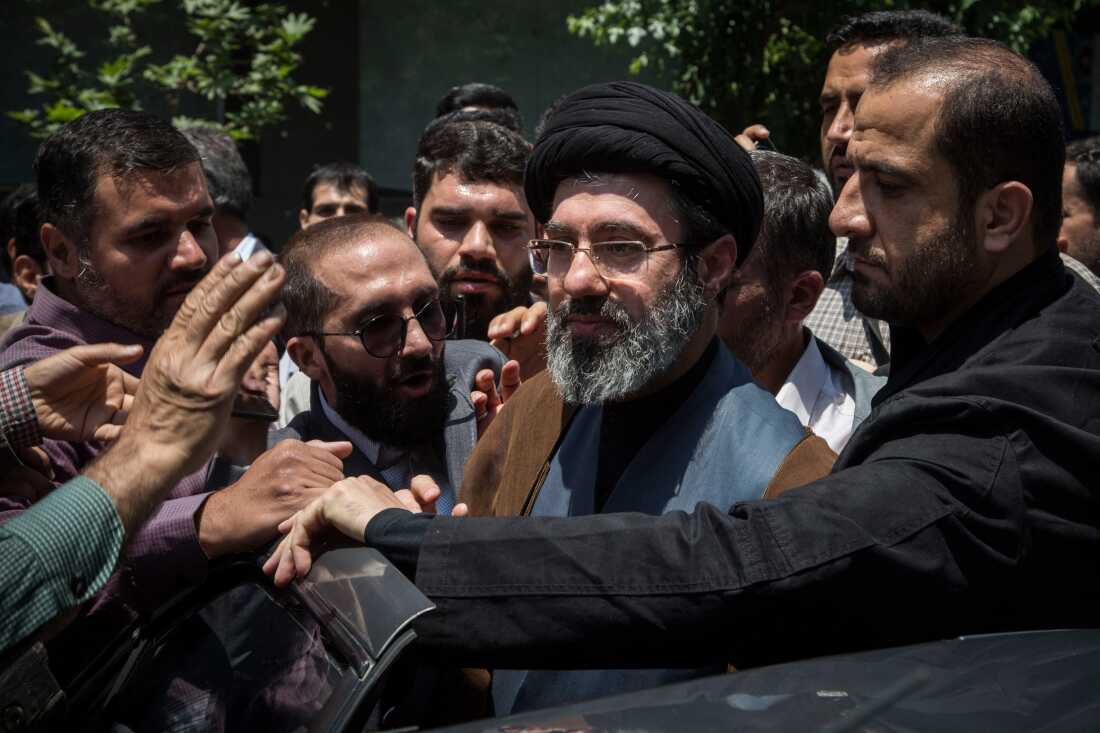 Mojtaba Khamenei (center), pictured here in 2019, is the son of former Iranian Supreme Leader Ayatollah Ali Khamenei. He was selected as the country's next supreme leader.