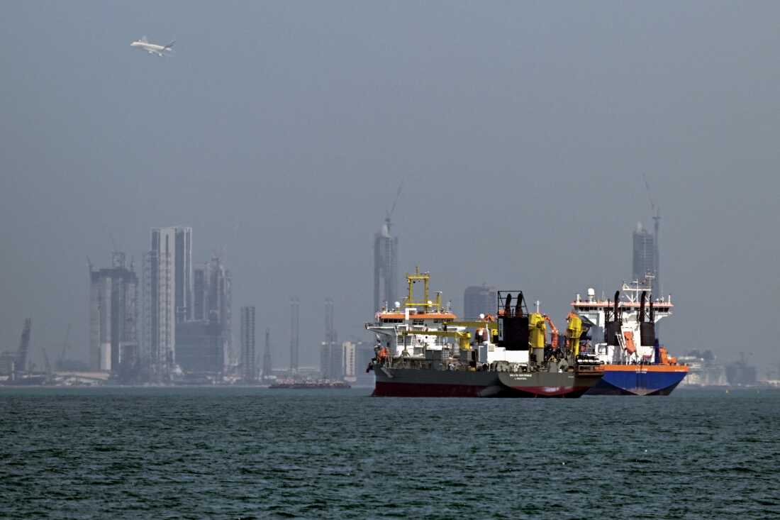 Commercial vessels are pictured offshore in Dubai, United Arab Emirates, on Wednesday, after attacks hit ships in the region.