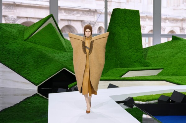 A model wears a creation from the Louis Vuitton Fall/Winter 2026-2027 Women's collection presented in Paris, Tuesday, March 10, 2026. (AP Photo/Aurelien Morissard)