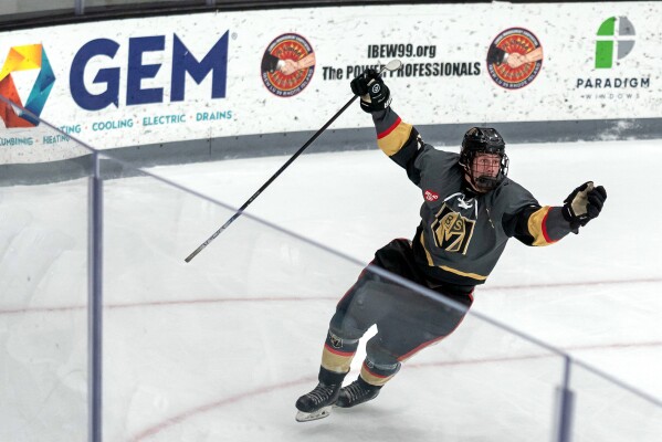 Blackstone Valley Schools forward Colin Dorgan celebrates after scoring the double-overtime game-winning goal against Portsmouth High School in the Rhode Island high school hockey state semifinal Wednesday, March 11, 2026, at Schneider Arena in Providence, R.I. (Courtesy of T.J. Auclair & Kyle Auclair/Little Big Leaguers Photography via AP)