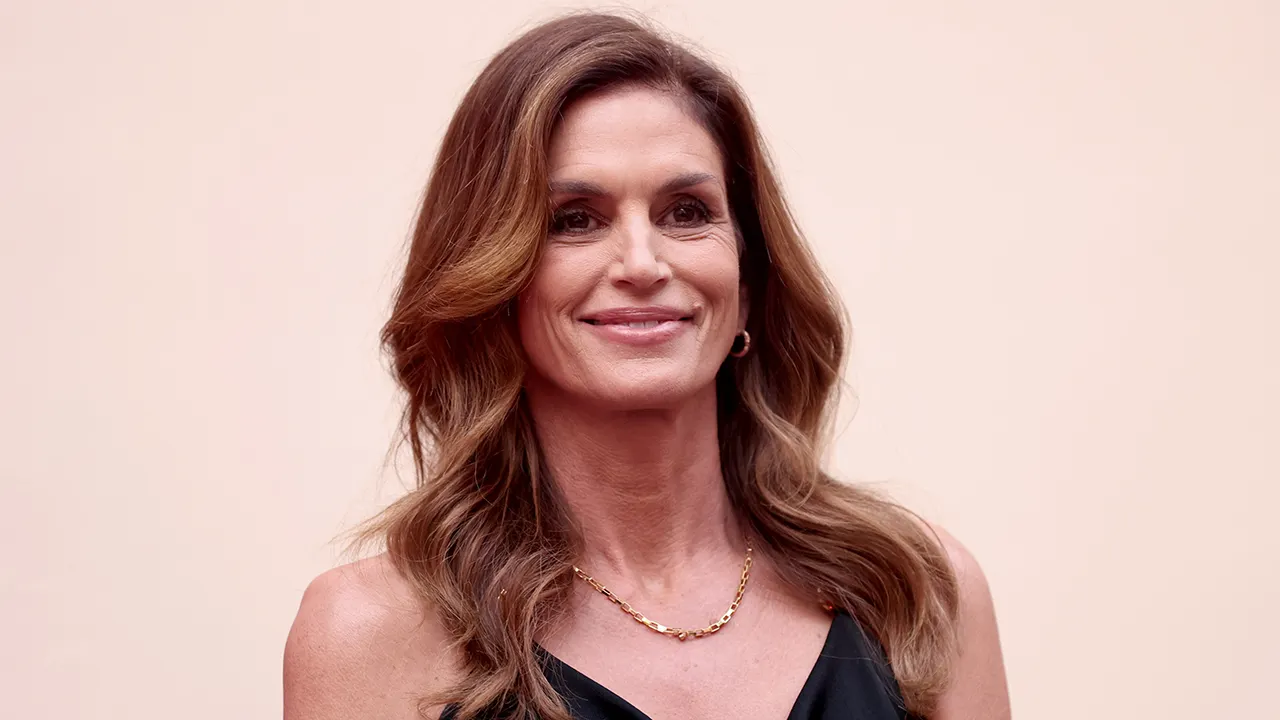 Supermodel Cindy Crawford skinny dips as part of her morning routine
