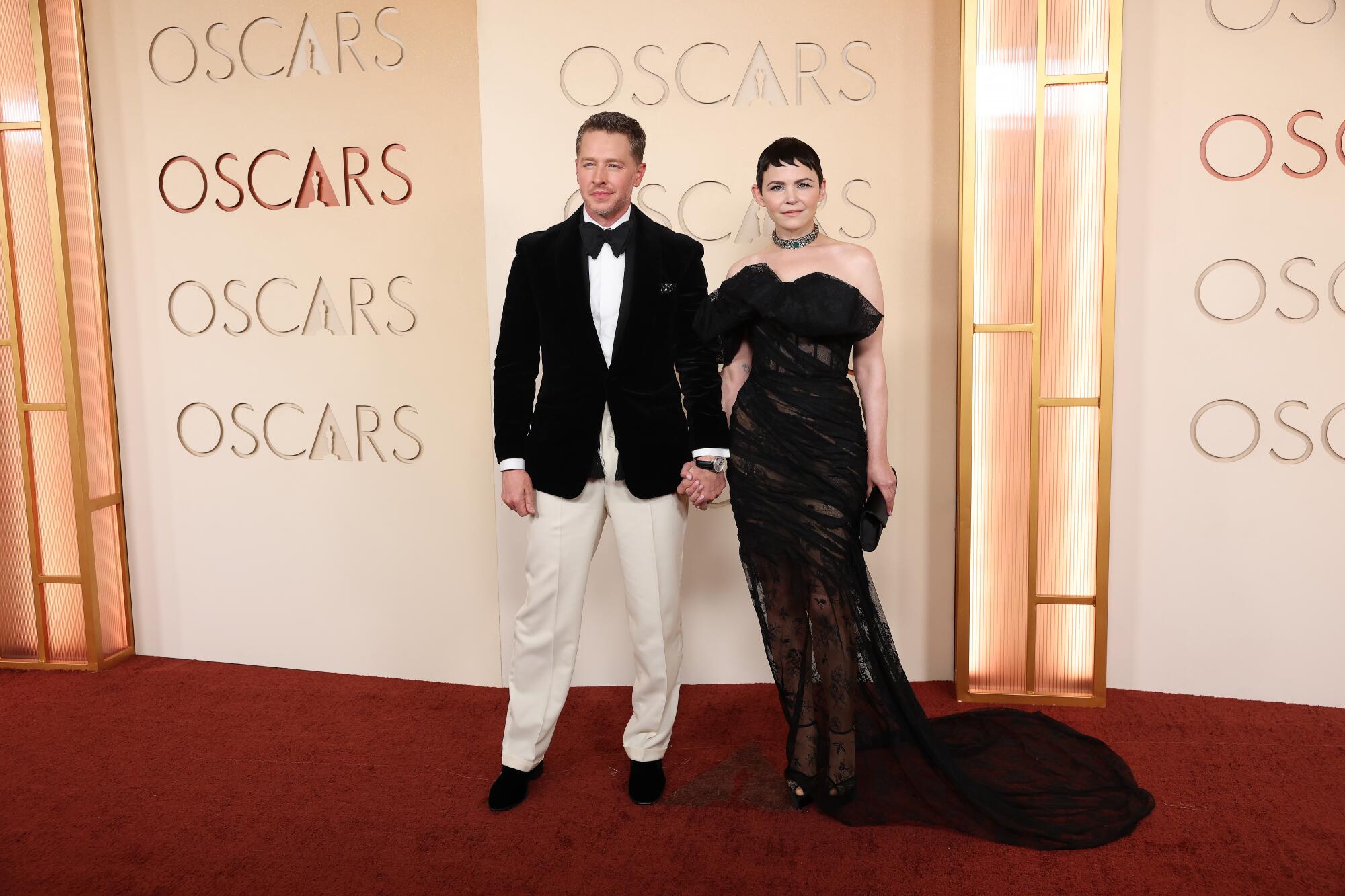 Josh Dallas and Ginnifer Goodwin pose on the red carpet. 