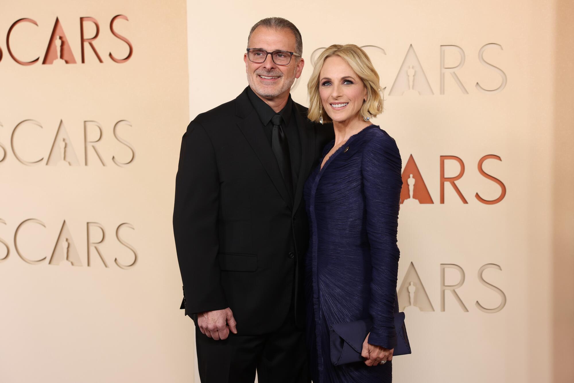Kevin Grandalski and Marlee Matlin pose on the red carpet. 