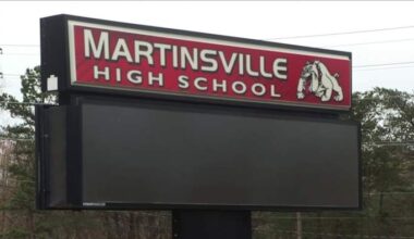 Storms knock down power poles, close road near Martinsville High School