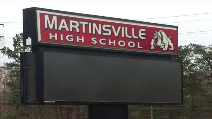 Storms knock down power poles, close road near Martinsville High School