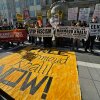 Pro-Palestinian protesters demanding the release of Columbia University graduate student Mahmoud Khalil stand outside his immigration court hearing in Newark, N.J., on Friday, March 28, 2025.