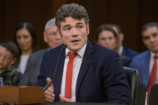Joseph Kent appears before a Senate Committee on Intelligence hearing for his pending confirmation to be director of the National Counterterrorism Center, on Capitol Hill, April 9, 2025, in Washington. (AP Photo/Rod Lamkey, Jr., File)