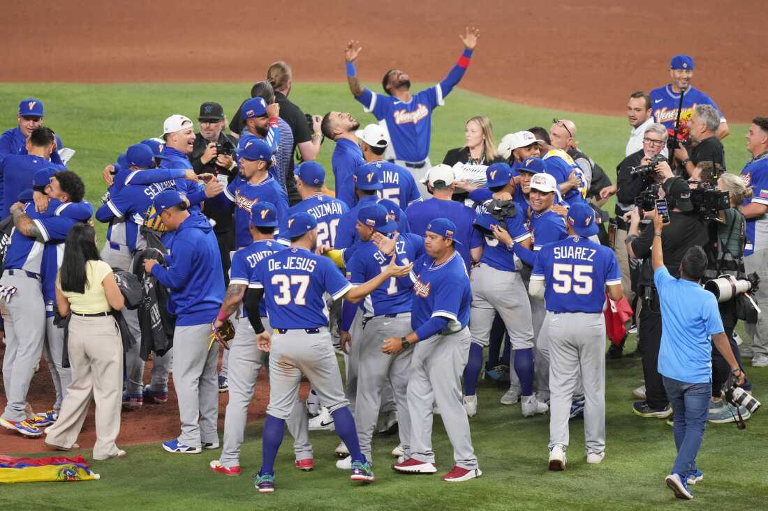 The Venezuela team celebrates after defeating the United States in the championship game of the World Baseball Classic, Tuesday, March 17, 2026, in Miami.
