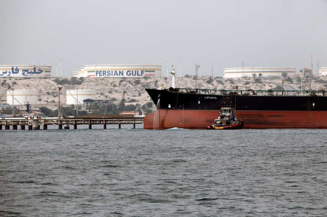 Iranian tanker docking at the platform of the oil facility in the Kharg Island, on the shore of the Persian Gulf. The island is responsible for 90% of Iran's oil exports, making it a lifeline for its economy.