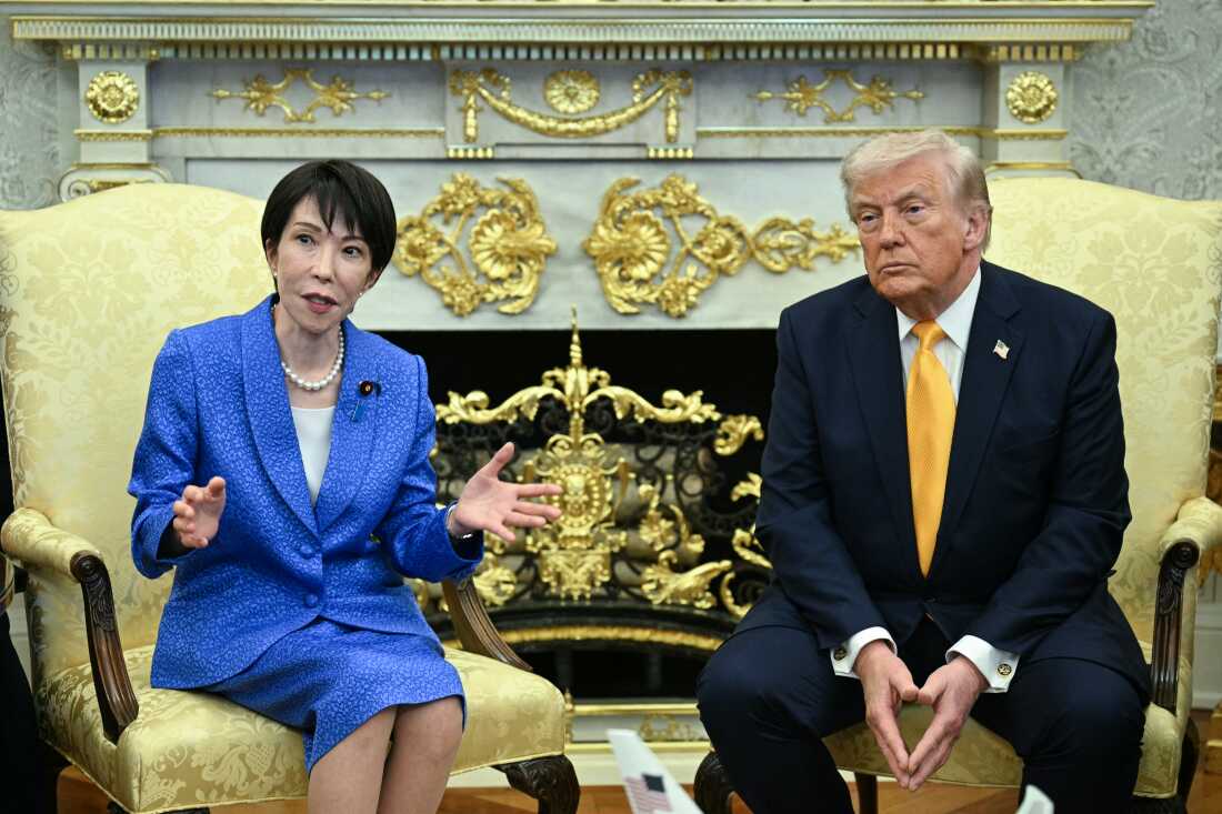 Japanese Prime Minister Sanae Takaichi sits with President Trump in the Oval Office of the White House in Washington on Thursday.