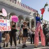 Protesters demonstrate against federal immigration actions at an "ICE Out of Everywhere" rally in front of City Hall in downtown Los Angeles on January 31.