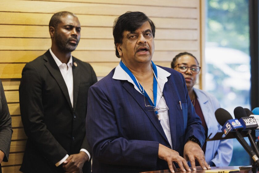 Resilience Healthcare CEO Dr. Manoj Prasad speaking to reporters at West Suburban Medical Center in August 2025.