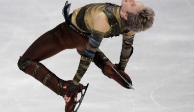 Malinin rebounds from Olympics at the worlds with a personal-best short program