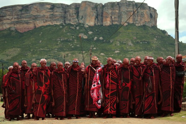 Initiates return after completing their passage to manhood at a traditional initiation school, in Phuthaditjhaba, South Africa, Saturday, Jan. 3, 2026. (AP Photo/Alfonso Nqunjana)
