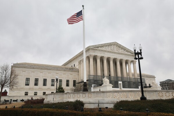 U.S. Supreme Court is seen, Wednesday, Jan. 14, 2026, in Washington. (AP Photo/Rahmat Gul)
