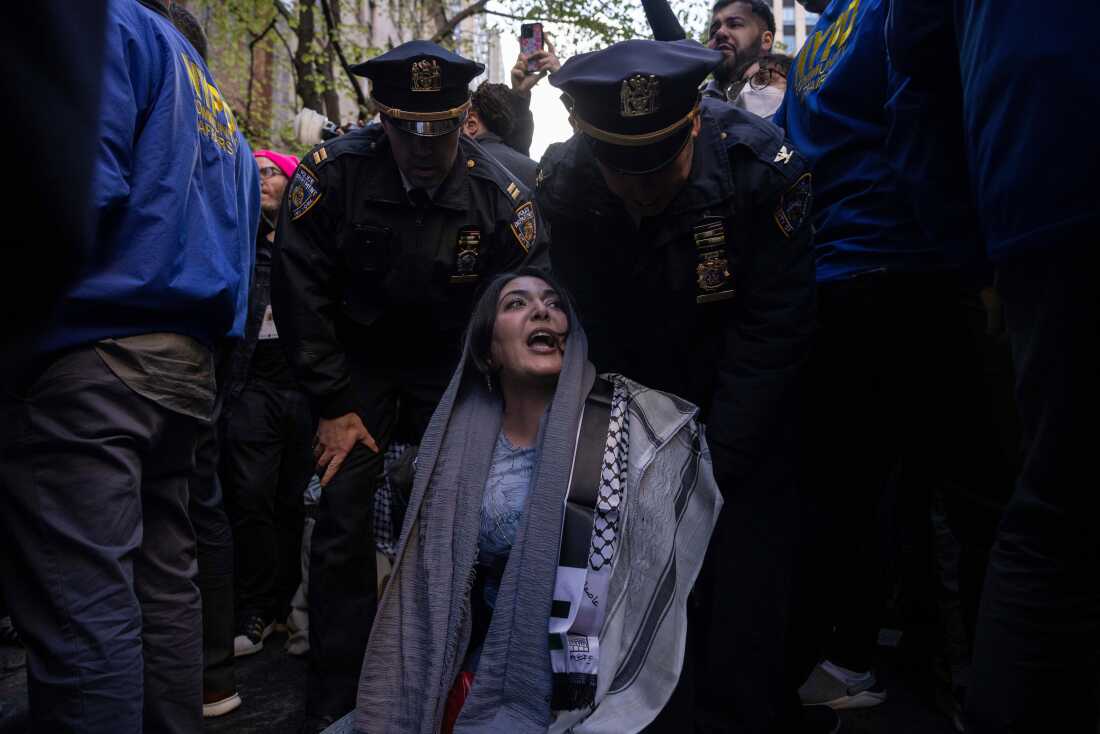 Police detain Nerdeen Kiswani, an organizer of pro-Palestinian demonstration group "Within Our Lifetime" during a protest on Friday, April 12, 2024, in New York.