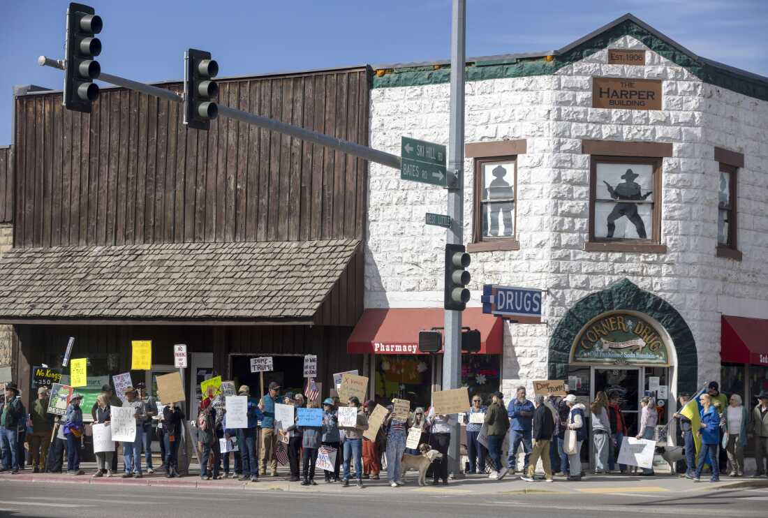 DRIGGS, IDAHO - MARCH 28: Protesters hold signs and chant slogans while attending a "No Kings" protest on March 28, 2026 in Driggs, Idaho. This is the third nationwide "No Kings" protest held against the Trump administration. (Photo by Natalie Behring/Getty Images)
